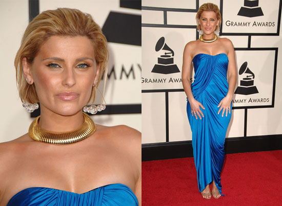 Nelly went bold in a cerulean strapless Arthur Mendonca gown