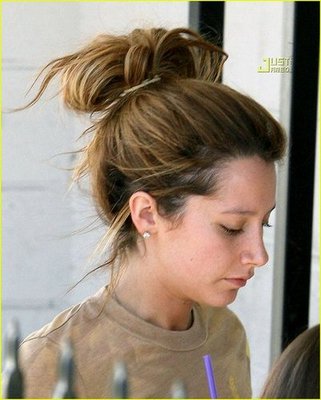 I saw these pics of Ashley Tisdale with brown hair on Just Jared 
