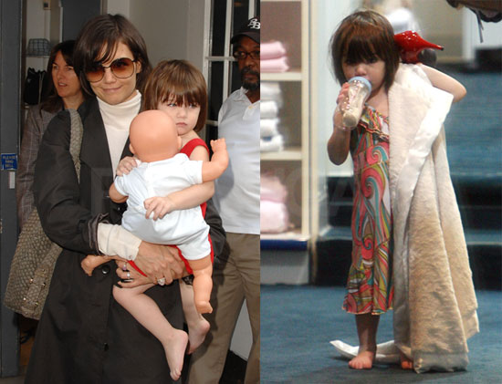 It's a good thing Suri's got her security bottle, blanket, baby dolland 