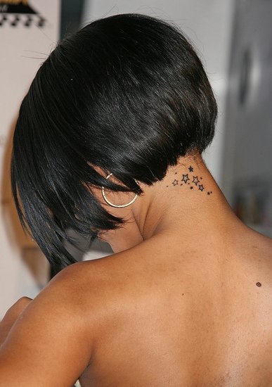 Here's an example picture of Rihanna's tattoo. star tattoo in her ear