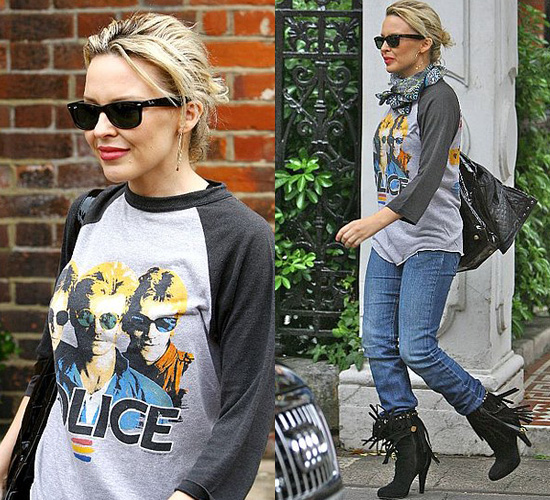 Kylie teamed her boots with a vintage Police tee with skinny jeans and Ray 