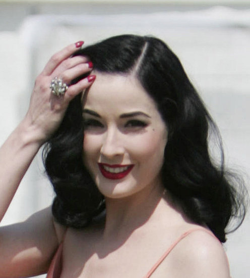 Dita Von Teese went for a more glamourous take on her 1940s pinup style at 