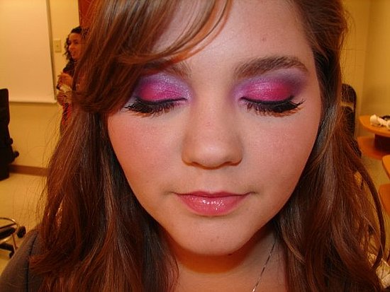 I lined her lower lash-line with a maroon-pink color, black eyeliner top and 