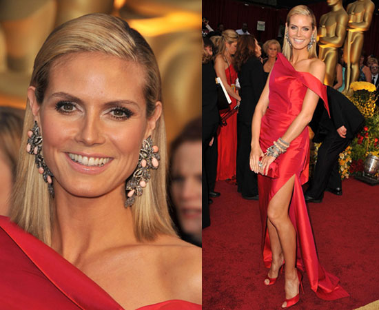  Heidi Klum wore a vivacious red dress by Roland Mouret and matching 