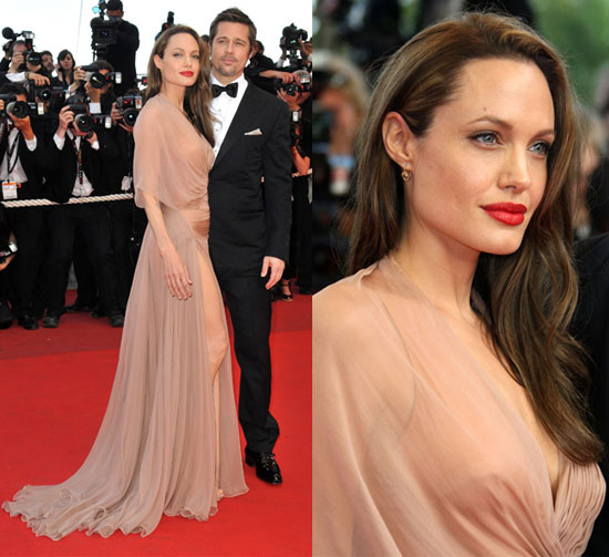 And those red lips — they match the red carpet. Swoon.