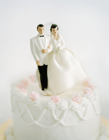 It's de rigueur for newlyweds to save the top tier of their wedding cake to